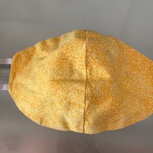 Yellow hand sown mask